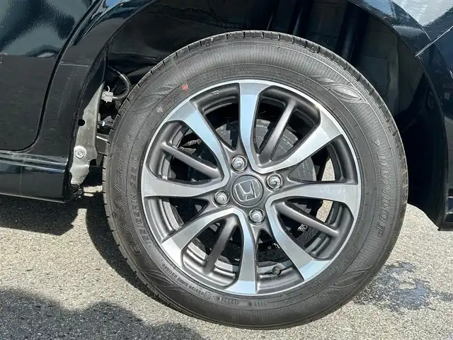ホンダ Ｎ ＢＯＸ カスタム 大阪府 2024(令6)年 0.5万km クリスタルブラックパール 社外ナビ/　TV/CD/DVD/Bluetooth/USB/ナビ装着用SPパッケージ/バックカメラ/衝突軽減ブレーキ/横滑り防止装置　/片側パワースライドドア　/前席シートヒーター　/クルーズコントロール/レーンキープアシスト/純正１４インチアルミホイール　　/ホンダセンシング/ブレーキホールド/ＬＥＤヘッドライト