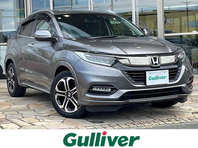 ホンダ ヴェゼル ハイブリッド Z ホンダセンシング 静岡県 2020(令2)年 2.6万km スーパープラチナグレーメタリック 安全装備/・ホンダセンシング/・バックカメラ/・レーンキープ/純正ナビ/・フルセグTV/・FM/AM/CD/DVD/USB/Bluetooth/ipod/主要装備/・レーダークルーズコントロール　　/・シートヒーター　/・パドルシフト　　　　　/・純正ドライブレコーダー　/・ブレーキホールド　/・オートライト　/・ＬＥＤヘッドライト/・スマートキー/・全席オートパワーウィンドウ/・プッシュスタート