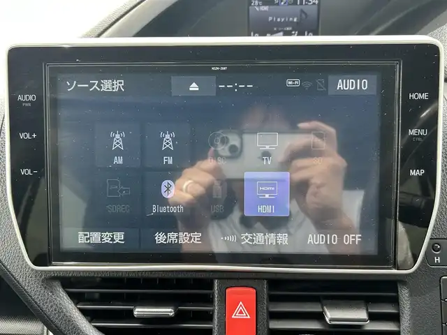 トヨタ ヴォクシー ZS 煌Ⅱ 岡山県 2019(令1)年 9.2万km ブラック 登録時走行距離91799km/ワンオーナー/純正10インチナビ/フルセグTV(AM.FM.CD.DVD.TV.BT)/純正12.1インチフリップダウンモニター/両側パワースライドドア/バックカメラ/ETC2.0/ドライブレコーダー/クリアランスソナー/衝突軽減ブレーキ/横滑り防止装置/クルーズコントロール/レーンキープアシスト/オートライト/オートマチックハイビーム/アイドリングストップ/16インチ純正AW/社外フロアマット