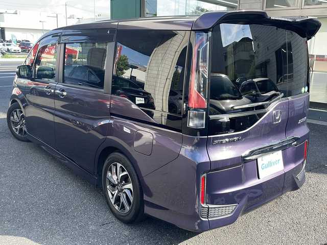 ホンダ ステップワゴン スパーダ ホンダセンシング 東京都 2017(平29)年 2.5万km プレミアムスパイスパープルP ワンオーナー/両側パワースライドドア/Gathers製SDナビ/・フルセグTV/BT/DVD/AM/FM/バックモニター/プッシュスタート/ビルトインETC/ドライブレコーダー（ZDR-012）/純正フロアマット/全席レザーシート/追従型クルーズコントロール/レーンキープアシスト/オートライト/盗難防止装置/エアバック（ダブル）/カーテンエアバック/衝突被害軽減システム/純正16インチAW/TEIN製ローダウンスプリング/スマートキー×2/保証書/取扱説明書/【積込】/社外製18インチAW×4/純正サスペンション