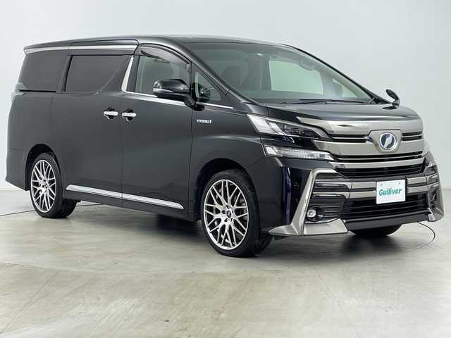 トヨタ ヴェルファイア ハイブリット ZR Gエディション 道央・札幌 2015(平27)年 6.1万km ブラック ・4WD/・純正SDナビ/　CD/BT/SD/・フルセグTV/・バックカメラ/・純正フリップダウンモニター/・両側パワースライドドア/・パワーバックドア/・クリアランスソナー/・レザーシート/・運転席メモリ付きパワーシート/・助手席パワーシート/・前席シートヒーター/・ステアリングリモコン/・ステアリングヒーター/・クルーズコントロール/・純正ドライブレコーダー/・ビルトインETC/・衝突軽減ブレーキ/・WORK20インチアルミホイール/・純正フロアマット/・純正ドアバイザー