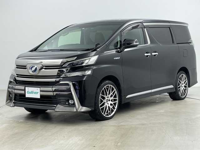 トヨタ ヴェルファイア ハイブリット ZR Gエディション 道央・札幌 2015(平27)年 6.1万km ブラック ・4WD/・純正SDナビ/　CD/BT/SD/・フルセグTV/・バックカメラ/・純正フリップダウンモニター/・両側パワースライドドア/・パワーバックドア/・クリアランスソナー/・レザーシート/・運転席メモリ付きパワーシート/・助手席パワーシート/・前席シートヒーター/・ステアリングリモコン/・ステアリングヒーター/・クルーズコントロール/・純正ドライブレコーダー/・ビルトインETC/・衝突軽減ブレーキ/・WORK20インチアルミホイール/・純正フロアマット/・純正ドアバイザー