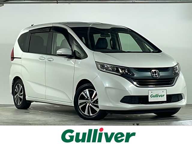 ホンダ フリード G ホンダセンシング 広島県 2017(平29)年 4.9万km ホワイトオーキッドパール 禁煙車/ホンダセンシング/・衝突軽減ブレーキ〈CMBS〉/・誤発進抑制機能/・ACC〈アダプティブ・クルーズ・コントロール〉/・LKAS〈車線維持支援システム〉/・歩行者事故低減ステアリング/・路外逸脱抑制機能/・先行車発進お知らせ機能/・標識認識機能/Sパッケージ/・本革巻ステアリングホイール/・コンビシート&専用インテリア/・15インチアルミホイール/・シートバックアッパーポケット/・LEDヘッドライト＋LEDアクティブコーナリングライト/Cパッケージ/・プラズマクラスター技術搭載エアコン/・ロールサンシェイド/・IRカット〈遮熱〉/UVカット機能付フロントウインドウガラス+IRカット〈遮熱〉/スーパーUVカットフロントドアガラス/・コンフォートビューパッケージ（親水/ヒーテッドドアミラー＋熱線入りフロントウインドウ＋フロントドア撥水ガラス）/純正ナビ（VXM-175VFi）/・フルセグ/CD/DVD/Bluetooth/SD/バックカメラ/フリップダウンモニター/純正ドアバイザー/ETC/スマートキー/プッシュスタート/スペアキー