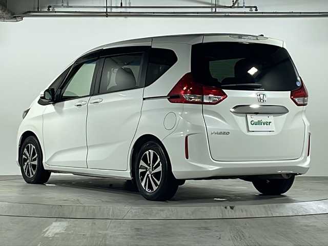 ホンダ フリード G ホンダセンシング 広島県 2017(平29)年 4.9万km ホワイトオーキッドパール 禁煙車/ホンダセンシング/・衝突軽減ブレーキ〈CMBS〉/・誤発進抑制機能/・ACC〈アダプティブ・クルーズ・コントロール〉/・LKAS〈車線維持支援システム〉/・歩行者事故低減ステアリング/・路外逸脱抑制機能/・先行車発進お知らせ機能/・標識認識機能/Sパッケージ/・本革巻ステアリングホイール/・コンビシート&専用インテリア/・15インチアルミホイール/・シートバックアッパーポケット/・LEDヘッドライト＋LEDアクティブコーナリングライト/Cパッケージ/・プラズマクラスター技術搭載エアコン/・ロールサンシェイド/・IRカット〈遮熱〉/UVカット機能付フロントウインドウガラス+IRカット〈遮熱〉/スーパーUVカットフロントドアガラス/・コンフォートビューパッケージ（親水/ヒーテッドドアミラー＋熱線入りフロントウインドウ＋フロントドア撥水ガラス）/純正ナビ（VXM-175VFi）/・フルセグ/CD/DVD/Bluetooth/SD/バックカメラ/フリップダウンモニター/純正ドアバイザー/ETC/スマートキー/プッシュスタート/スペアキー