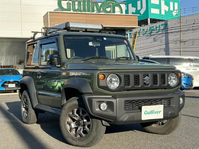 スズキ ジムニー シエラ JC 埼玉県 2023(令5)年 4.8万km ジャングルグリーン 純正ナビ（Ｂｌｕｅｔｏｏｔｈ、ＣＤ、ＤＶＤ、ＴＶ）/バックカメラ/ＥＴＣ/ワンオーナー/４ＷＤ/クルコン/Ｄ＋Ｎ席シートヒーター/純正フロアマット/純正アルミホイール/ＬＥＤヘッド/ルーフレール/背面タイヤ/ダウンヒルアシストコントロール/オートライト/オートマチックハイビーム/保証書/取扱説明書/ナビ取扱説明書/アイドリングストップ/横滑り防止装置/レーンキープアシスト/ダブル＋サイドエアバッグ/衝突被害軽減システム/カーテンエアバッグ