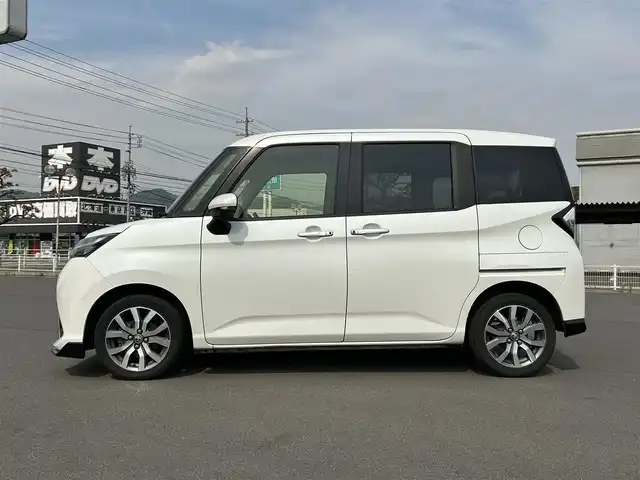 トヨタ タンク カスタムG－T 岡山県 2016(平28)年 7.7万km パールホワイトⅢ 純正9インチメモリーナビ/ CD/DVD/SD/Bluetooth/フルセグ/バックカメラ/後席用フリップダウンモニター/両側パワースライドドア/スマートアシスト/クルーズコントロール/アダプティブハイビーム/衝突被害軽減ブレーキ/先行車発進告知/LEDオートヘッドライト/シートヒーター/スマートキー×2/禁煙車