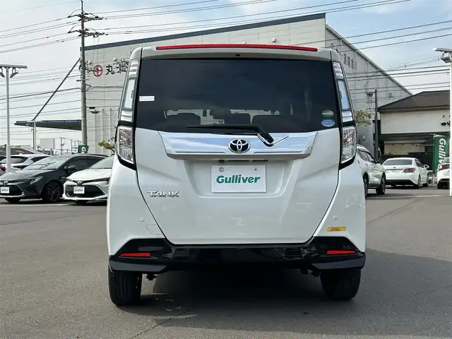 トヨタ タンク カスタムG－T 岡山県 2016(平28)年 7.7万km パールホワイトⅢ 純正9インチメモリーナビ/ CD/DVD/SD/Bluetooth/フルセグ/バックカメラ/後席用フリップダウンモニター/両側パワースライドドア/スマートアシスト/クルーズコントロール/アダプティブハイビーム/衝突被害軽減ブレーキ/先行車発進告知/LEDオートヘッドライト/シートヒーター/スマートキー×2/禁煙車