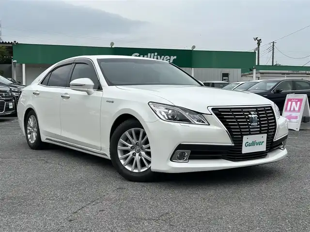 トヨタ クラウン ハイブリッド ロイヤルサルーンG 千葉県 2013(平25)年 4.3万km ホワイトパールクリスタルシャイン 純正メーカーオプションHDDナビ/・CD/DVD/MSV/Bluetooth/フルセグ/バックカメラ/クルーズコントロール/スマートキー/前席パワーシート/社外車高調/トランクイージークローザー/社外前後ドライブレコーダー/ビルトインETC/純正LEDヘッドライト/フォグランプ/ウッドコンビステアリング/純正16インチアルミホイール/木目調パネル/ドアバイザー/サイド＆カーテンエアバッグ/新車時保証書＆取扱説明書