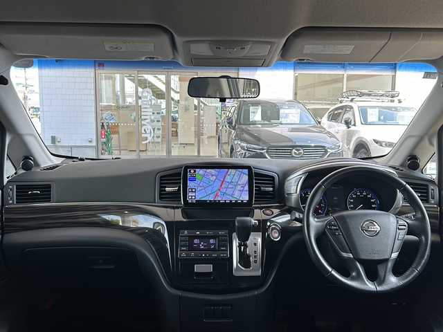 日産 エルグランド 250ハイウェイスター 京都府 2014(平26)年 8.3万km ファントムブラック PanasonicSDナビ/（フローティングナビ　CN-F1DVD）　/フルセグTV/FM/AM/Bluetooth/CD/DVD/USB/SDミュージックサーバー/純正フリップダウンモニター/外19インチＡＷ/　ESTATUS/Style-CTRGloss Black/両側パワースライドドア/パワーバックドア/バックカメラ/3列シート/オットマン/ウォークスルー/クルーズコントロール/ビルトインETC/WAC/LEDライト/オートライト/禁煙車