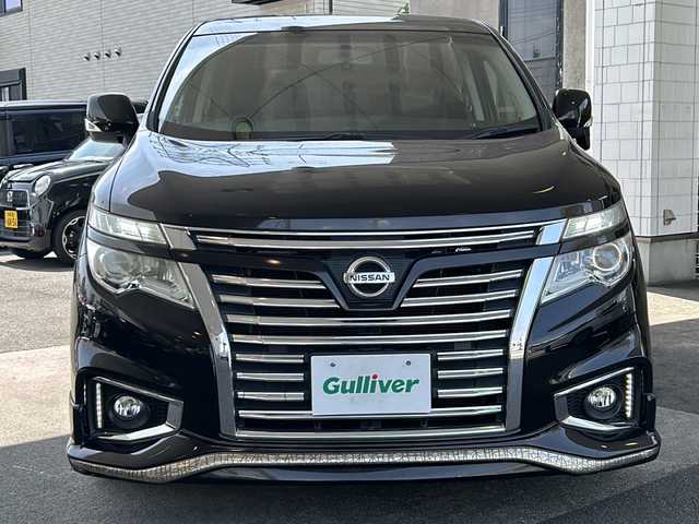 日産 エルグランド 250ハイウェイスター 京都府 2014(平26)年 8.3万km ファントムブラック PanasonicSDナビ/（フローティングナビ　CN-F1DVD）　/フルセグTV/FM/AM/Bluetooth/CD/DVD/USB/SDミュージックサーバー/純正フリップダウンモニター/外19インチＡＷ/　ESTATUS/Style-CTRGloss Black/両側パワースライドドア/パワーバックドア/バックカメラ/3列シート/オットマン/ウォークスルー/クルーズコントロール/ビルトインETC/WAC/LEDライト/オートライト/禁煙車
