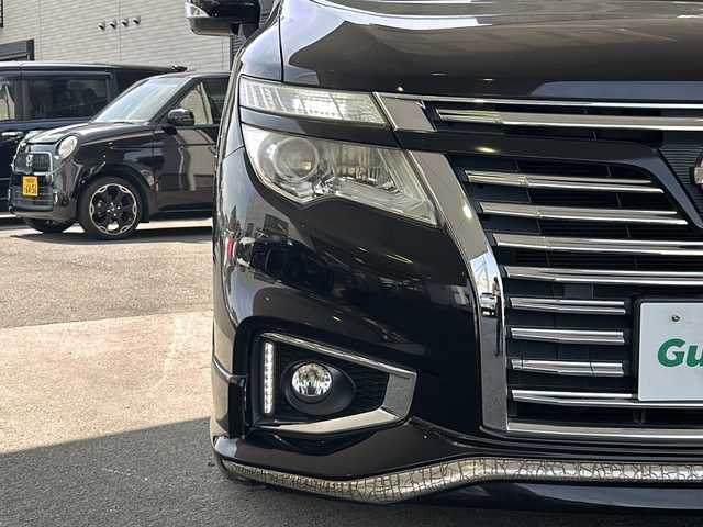 日産 エルグランド 250ハイウェイスター 京都府 2014(平26)年 8.3万km ファントムブラック PanasonicSDナビ/（フローティングナビ　CN-F1DVD）　/フルセグTV/FM/AM/Bluetooth/CD/DVD/USB/SDミュージックサーバー/純正フリップダウンモニター/外19インチＡＷ/　ESTATUS/Style-CTRGloss Black/両側パワースライドドア/パワーバックドア/バックカメラ/3列シート/オットマン/ウォークスルー/クルーズコントロール/ビルトインETC/WAC/LEDライト/オートライト/禁煙車