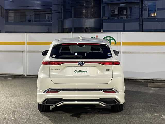 トヨタ ハリアー ハイブリッド Z 愛知県 2021(令3)年 1.2万km ホワイトパールクリスタルシャイン /禁煙//ワンオーナー//モデリスタフルエアロ//メーカーオプションナビ//AM/FM/USB/AUX/BT/フルセグ//Miracast//JBLプレミアムサウンド//PCS/ACC/AHB/RSA/LTA//PKSB/RCTA/BSM/HUD//クリアランスソナー//ビルトインETC2.0//パノラミックビューモニター//デジタルインナーミラー//オートLEDライト//フォグランプ//ハーフレザーシート//D席パワーシート//本革巻きステアリング//ステアリングリモコン//オートリトラクラブルウィンカーミラー//電動パーキングブレーキ//AUTO HOLD//MT付きAT//パワーバックドア//電動チルト＆テレスコピック//スペアタイヤ//EV MODE//DRIVE MODE//ECO/NORMAL/SPORT//横滑り防止装置//プッシュスタート//スマートキー//スペアキー//ISOFIX//純正フロアマット//ドアバイザー//トノカバー//照明付きバニティミラー//保証書//取扱説明書//ナビ取扱説明書//R3-6年記録簿