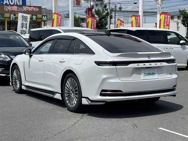 トヨタ クラウン Z 群馬県 2025(令7)年 0.1千km プレシャスホワイトパール 純正12.3インチDA/AppleCarPlay・AndroidAuto/ナビ・USB・HDMI・BT・フルセグTV/パノラマルーフ/モデリスタエアロ(F/S/R)/バック/サイド/フロント/全方位カメラ/デジタルインナーミラー/置くだけ充電電動リアシェード/全席シートベンチレーション/全席シートヒーター/全席パワーシートシートメモリー/ステアリングヒーター/イージークローザー（全ドア・トランク）/カラーヘッドアップディスプレイ/純正AW純正フロアマット/ブラインドスポットモニター/Toyota Safety Sense/・プリクラッシュセーフティ/・レーントレーシングアシスト/・レーンディパーチャーアラート/・レーダークルーズコントロール/・アダプティブハイビームシステム/・ロードサインアシスト/・ドライバー異常時対応システム/・プロアクティブドライビングアシスト/・発進遅れ告知機能/・緊急時操舵支援（アクティブ操舵機能付）/・フロントクロストラフィックアラート/・レーンチェンジアシスト