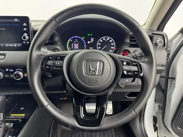 ホンダ ヴェゼル ハイブリッド e:HEV Z 愛知県 2021(令3)年 3.8万km プレミアムサンライトホワイトパール ・ワンオーナー/・ワイヤレス充電/・純正9インチナビ/・Bluetooth/・Apple CarPlay/・Android Auto/・バックカメラ/・ホンダセンシング/・衝突被害軽減システム/・コーナーセンサー/・クルーズコントロール/・ブラインドスポットモニター/・パドルシフト/・レーンキープアシスト/・オートマチックハイビーム/・オートライト/・LEDヘッドライト/・LEDフォグランプ/・ETC2.0/・シートヒーター/・ステアリングヒーター/・純正AW/・プッシュスタート/・スマートキー/・スペアキー