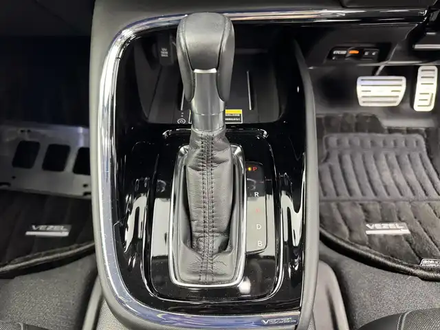 ホンダ ヴェゼル ハイブリッド e:HEV Z 愛知県 2021(令3)年 3.8万km プレミアムサンライトホワイトパール ・ワンオーナー/・ワイヤレス充電/・純正9インチナビ/・Bluetooth/・Apple CarPlay/・Android Auto/・バックカメラ/・ホンダセンシング/・衝突被害軽減システム/・コーナーセンサー/・クルーズコントロール/・ブラインドスポットモニター/・パドルシフト/・レーンキープアシスト/・オートマチックハイビーム/・オートライト/・LEDヘッドライト/・LEDフォグランプ/・ETC2.0/・シートヒーター/・ステアリングヒーター/・純正AW/・プッシュスタート/・スマートキー/・スペアキー