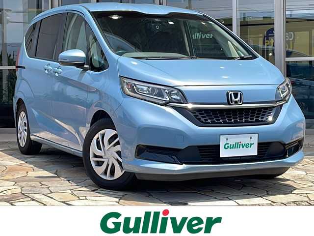 ホンダ フリード G ホンダセンシング 静岡県 2020(令2)年 6.4万km シーグラスブルーパール 【安全装備】/ホンダセンシング/アダプティブ・クルーズ・コントロール（ACC）/・作動車速域：約30km/hから100km/h間/車線維持支援システム（LKAS）/・作動車速：約65km/hから100km/h間/・ステアリング制御/衝突軽減ブレーキ（CMBS）/・歩行者検知機能/・作動車速：約80km/h未満時/・対向車車速：約30km/hから80km/h時/誤発進抑制機能（前進）/・ミリ波レーダー検知：作動車速10km/h未満/歩行者事故低減ステアリング/・作動車速10km/hから40km/h間/路外逸脱抑制機能/・作動車速：約60km/hから100km/h間/先行車発進お知らせ機能/標識認識機能/【主要装備】/両側パワースライドドア　/純正ナビ　/フルセグテレビ　/バックカメラ　/プッシュスタート　/スマートキー　/ＬＥＤヘッドライト　/ステアリングスイッチ　/ドライブレコーダー　/シートヒーター　/ＥＴＣ