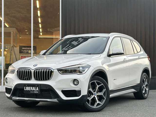 ＢＭＷ Ｘ１ xDrive 18d xライン 福岡県 2017(平29)年 6.4万km アルピンホワイトⅢ インテリジェントセーフティ/ハーフレザーシート/シートヒーター/純正ナビ　/バックカメラ/Bluetooth/パワーバックドア/オートライト　/フロントフォグランプ/リアフォグランプ　/ステアリングスイッチ/社外レーダー探知機　/純正１８インチアルミホイール/ミラー一体型ETC