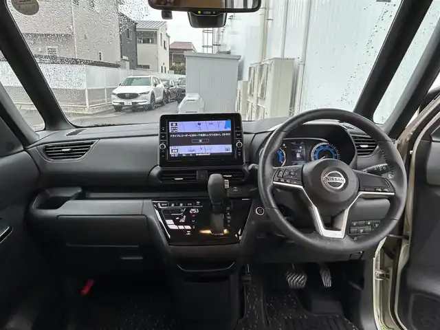 日産 ルークス ハイウェイスター Gターボ 香川県 2021(令3)年 1.4万km フローズンバニラパール 純正9インチメモリーナビ/→AM/FM/CD/DVD/Bluetooth/フルセグTV/アラウンドビューモニター/レザー調シートカバー/片側パワースライドドア/LEDヘッドライト/アイドリングストップ/衝突軽減ブレーキ/ETC/ドライブレコーダー/コーナーセンサー/革巻きステアリング/ステアリングスイッチ/サンシェード/純正15インチアルミホイール/純正フロアマット/プッシュスタート/スマートキー/サーキュレーター