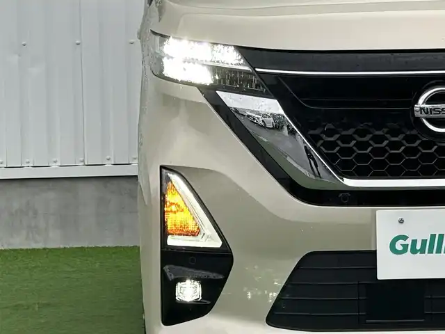 日産 ルークス ハイウェイスター Gターボ 香川県 2021(令3)年 1.4万km フローズンバニラパール 純正9インチメモリーナビ/→AM/FM/CD/DVD/Bluetooth/フルセグTV/アラウンドビューモニター/レザー調シートカバー/片側パワースライドドア/LEDヘッドライト/アイドリングストップ/衝突軽減ブレーキ/ETC/ドライブレコーダー/コーナーセンサー/革巻きステアリング/ステアリングスイッチ/サンシェード/純正15インチアルミホイール/純正フロアマット/プッシュスタート/スマートキー/サーキュレーター