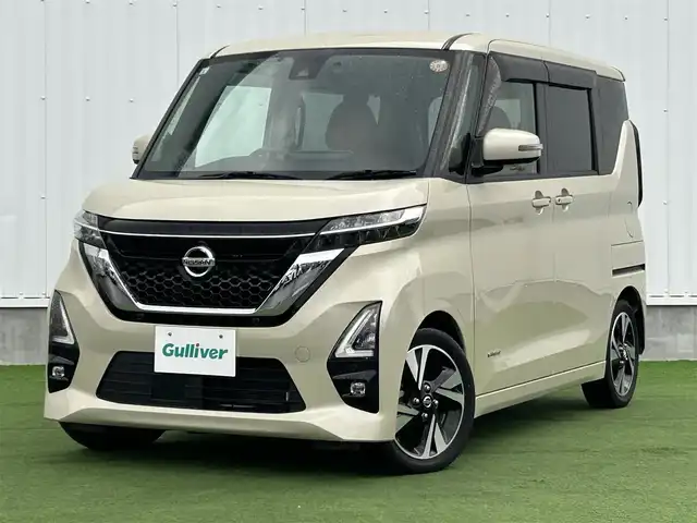 日産 ルークス ハイウェイスター Gターボ 香川県 2021(令3)年 1.4万km フローズンバニラパール 純正9インチメモリーナビ/→AM/FM/CD/DVD/Bluetooth/フルセグTV/アラウンドビューモニター/レザー調シートカバー/片側パワースライドドア/LEDヘッドライト/アイドリングストップ/衝突軽減ブレーキ/ETC/ドライブレコーダー/コーナーセンサー/革巻きステアリング/ステアリングスイッチ/サンシェード/純正15インチアルミホイール/純正フロアマット/プッシュスタート/スマートキー/サーキュレーター