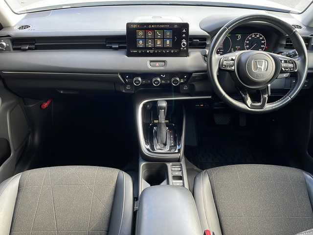 ホンダ ヴェゼル ハイブリッド 長野県 2023(令5)年 3.2万km プレミアムサンライトホワイトパール 純正メーカーナビフルセグＴＶ/バックカメラ/ＥＴＣ２．０/パワーバックドア/ハーフレザーシート/シートヒーター/ステアリングヒーター/純正１８インチアルミ/レーダークルーズコントロール/パーキングセンサー/保証書/スペアキー