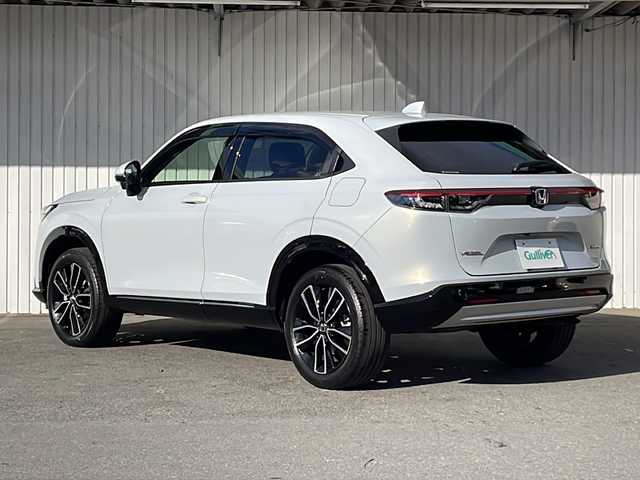 ホンダ ヴェゼル ハイブリッド 長野県 2023(令5)年 3.2万km プレミアムサンライトホワイトパール 純正メーカーナビフルセグＴＶ/バックカメラ/ＥＴＣ２．０/パワーバックドア/ハーフレザーシート/シートヒーター/ステアリングヒーター/純正１８インチアルミ/レーダークルーズコントロール/パーキングセンサー/保証書/スペアキー