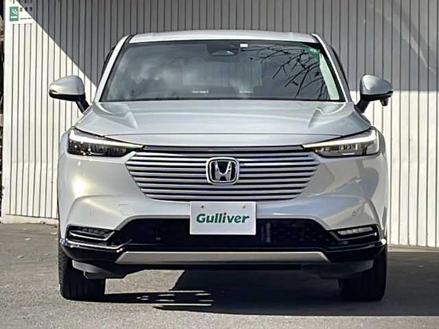 ホンダ ヴェゼル ハイブリッド 長野県 2023(令5)年 3.2万km プレミアムサンライトホワイトパール 純正メーカーナビフルセグＴＶ/バックカメラ/ＥＴＣ２．０/パワーバックドア/ハーフレザーシート/シートヒーター/ステアリングヒーター/純正１８インチアルミ/レーダークルーズコントロール/パーキングセンサー/保証書/スペアキー