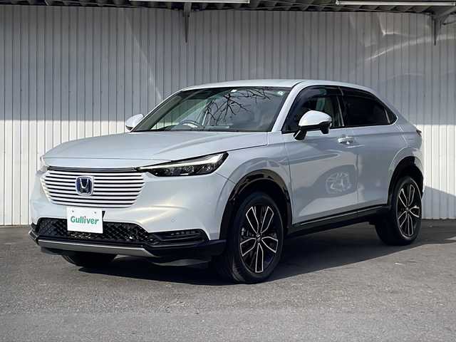 ホンダ ヴェゼル ハイブリッド 長野県 2023(令5)年 3.2万km プレミアムサンライトホワイトパール 純正メーカーナビフルセグＴＶ/バックカメラ/ＥＴＣ２．０/パワーバックドア/ハーフレザーシート/シートヒーター/ステアリングヒーター/純正１８インチアルミ/レーダークルーズコントロール/パーキングセンサー/保証書/スペアキー