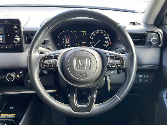 ホンダ ヴェゼル ハイブリッド 長野県 2023(令5)年 3.2万km プレミアムサンライトホワイトパール 純正メーカーナビフルセグＴＶ/バックカメラ/ＥＴＣ２．０/パワーバックドア/ハーフレザーシート/シートヒーター/ステアリングヒーター/純正１８インチアルミ/レーダークルーズコントロール/パーキングセンサー/保証書/スペアキー