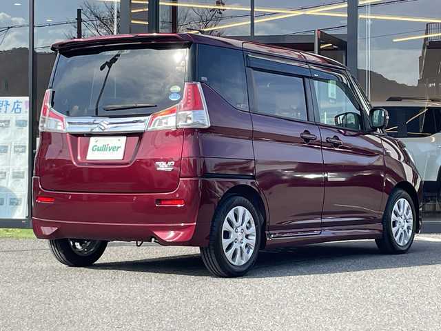 スズキ ソリオ HV MZ 大阪府 2020(令2)年 5.8万km クラレットレッドM ワンオーナー/8型ナビ（MDV-S707L）/フルセグTV/CD/DVD/BT/両側電動スライドドア/社外デジタルインナーミラー/LEDライト/オートライト/衝突軽減システム/レーンキープアシスト/レーダークルーズコントロール/純正１５インチAW/全方位カメラ/ドライブレコーダー/シートヒーター/フロントフォグ/ウインカーミラー/取説/保証書/スペアキーｘ１