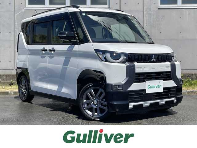 三菱 デリカミニ G プレミアム 静岡県 2024(令6)年 1.2万km アメジストブラック/シルキーホワイト 社外KENWOODナビ/　AM FM CD DVD Bluetooth SD/前方ドライブレコーダー/LEDオートヘッドライト/ハーフレザーシート/シートヒーター(前席)/デジタルインナーミラー/両側パワースライドドア/ステアリングヒーター/オートブレーキホールド/純正15インチアルミホイール/前後方クリアランスソナー/リアサンシェード/マイパイロット/アラウンドビューモニター/ビルトインETC