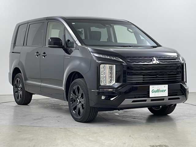 三菱 デリカＤ：５ シャモニー 道央・札幌 2025(令7)年 0.1万km未満 黒Ⅱ ・4WD/・CHAMONIX　７人乗り/・e-Assist/・11インチメモリナビ/・ＤＶＤ・ＣＤ・ＢＴ・ＳＤ・フルセグTV/・全方位カメラ/・ 両側パワースライドドア/・パワーバックドア/・レーダークルーズコントロール/・LEDヘッドライト/フォグランプ/・ハーフレザーシート/・パワーシート/・ステアリングヒーター/・純正18インチアルミホイール/・パドルシフト/・アイドリングストップ/・横滑り防止装置/・レーンアシスト/・スペアキー(1本)/・スマートキー