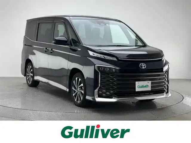 トヨタ ヴォクシー ハイブリッド S－Z 兵庫県 2022(令4)年 2.8万km スパークリングブラックパールクリスタルシャイン 純正メモリナビ(CD/DVD/フルセグ/Bluetooth)/バックカメラ/前後コーナーセンサー/全車速レーダークルーズコントロール/両側パワースライドドア/ハーフレザーシート/シートヒーター(D+N席)/三眼LEDヘッドライト/オートライト/オートマチックハイビーム/純正17インチアルミホイール/純正フロアマット/レーンキープアシスト/クリアランスソナー