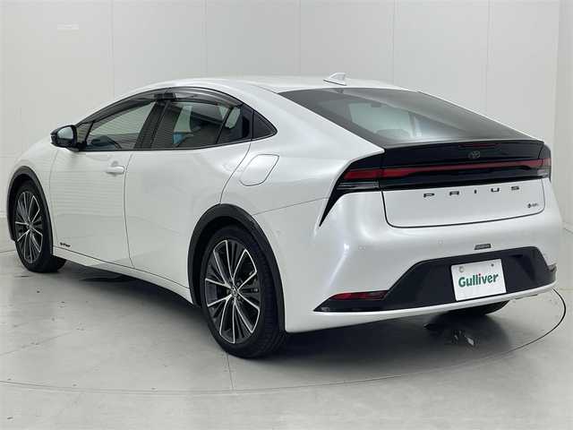 トヨタ プリウス Z 茨城県 2023(令5)年 1.5万km プラチナホワイトパールマイカ 純正12.3型DA/・ナビ機能あり(未更新)/全周囲カメラ/フルセグ/AC100V/ワイヤレス充電器 /アドバンストパーク/衝突被害軽減ブレーキ/車線逸脱抑制装置/レーダークルーズコントロール/オートマチックハイビーム/クリアランスソナー/BSM/ETC2.0/ドラレコ/シートヒーター/ベンチレーション/ステアリングヒーター/純正19インチAW/LEDヘッドライト/スマートキー