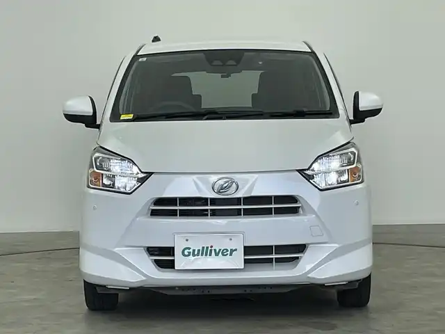 ダイハツ ミラ イース G SAⅢ 群馬県 2021(令3)年 2万km シャイニングホワイトパール 社外７型Ｗナビ　スマートアシスト３　衝突軽減　オートハイビーム　横滑り防止　コーナーセンサー　シートヒーター　前後ドラレコ　ＬＥＤヘッド　プッシュスタート　スマートキー　スペアキー　純正アルミ　禁煙車