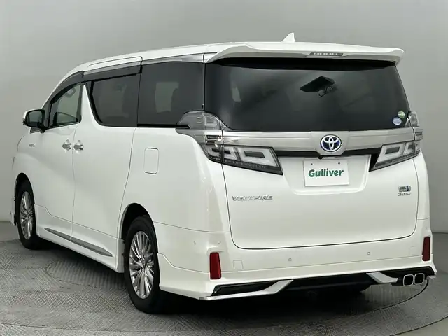 トヨタ ヴェルファイア ハイブリット ZR 道央・札幌 2019(令1)年 6.5万km ホワイトパールクリスタルシャイン ・４WD/・ダブルサンルーフ/・トヨタセーフティセンス/・プリクラッシュセーフティ/・レーンキープアシスト/・レーダークルーズコントロール/・オートハイビーム/・パーキングサポートブレーキ/・リアクロストラフィックアラート/・ロードサインアシスト/・ブラインドスポットモニター/・メーカーナビ/・バックカメラ/フルセグ/BT/CD/DVD/JBL/・フリップダウンモニター/・両側パワースライドドア/・シートヒーター/・シートクーラー/・シートメモリ/・ビルトインETC/・コーナーセンサー/・LEDヘッドライト