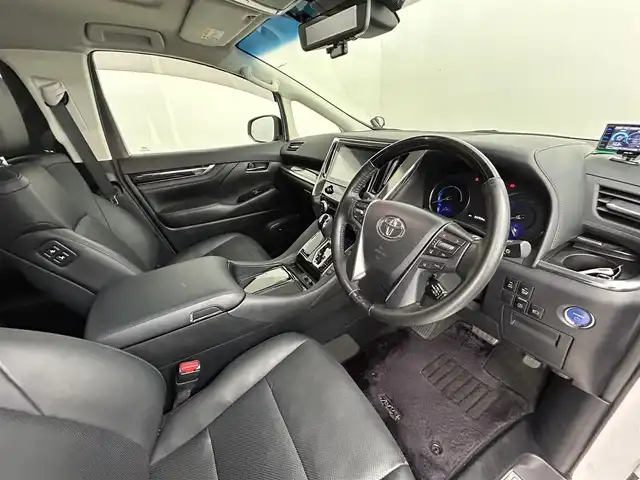 トヨタ ヴェルファイア ハイブリット ZR 道央・札幌 2019(令1)年 6.5万km ホワイトパールクリスタルシャイン ・４WD/・ダブルサンルーフ/・トヨタセーフティセンス/・プリクラッシュセーフティ/・レーンキープアシスト/・レーダークルーズコントロール/・オートハイビーム/・パーキングサポートブレーキ/・リアクロストラフィックアラート/・ロードサインアシスト/・ブラインドスポットモニター/・メーカーナビ/・バックカメラ/フルセグ/BT/CD/DVD/JBL/・フリップダウンモニター/・両側パワースライドドア/・シートヒーター/・シートクーラー/・シートメモリ/・ビルトインETC/・コーナーセンサー/・LEDヘッドライト