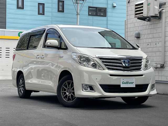 トヨタ アルファードハイブリット G 道央・札幌 2012(平24)年 14.5万km ゴールドパールクリスタルシャイン 4WD/社外HDDナビ(フルセグ、CD、DVD、Bt、AM、FM、SD)/ツインサンルーフ/バックカメラ/フリップダウンモニター/クルーズコントロール/両側パワースライドドア/革調シートカバー/パワーシート(D/N)/スマートキー/プッシュスタート/キセノンヘッドライト/オートライト/フォグランプ/社外16インチアルミホイール/純正16インチAW夏タイヤ車載/ETC/新車時保証書/取扱説明書/スペアキー×1