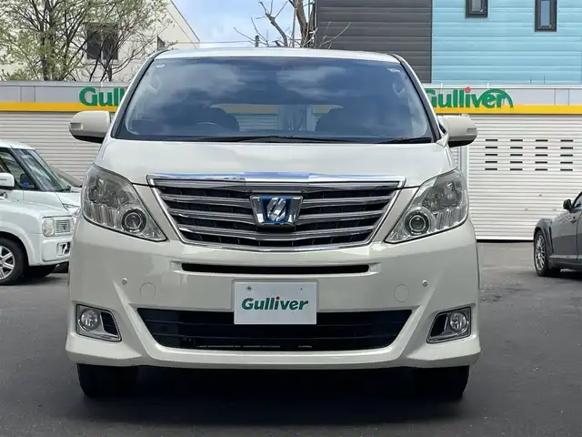 トヨタ アルファードハイブリット G 道央・札幌 2012(平24)年 14.5万km ゴールドパールクリスタルシャイン 4WD/社外HDDナビ(フルセグ、CD、DVD、Bt、AM、FM、SD)/ツインサンルーフ/バックカメラ/フリップダウンモニター/クルーズコントロール/両側パワースライドドア/革調シートカバー/パワーシート(D/N)/スマートキー/プッシュスタート/キセノンヘッドライト/オートライト/フォグランプ/社外16インチアルミホイール/純正16インチAW夏タイヤ車載/ETC/新車時保証書/取扱説明書/スペアキー×1