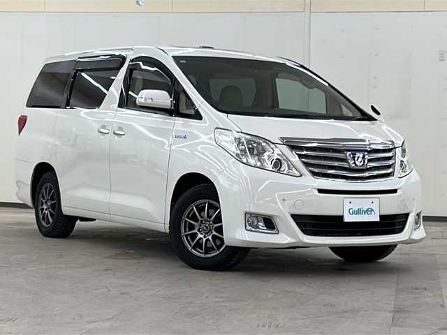 トヨタ アルファードハイブリット G 道央・札幌 2012(平24)年 14.5万km ゴールドパールクリスタルシャイン /4WD//社外HDDナビ(フルセグ、CD、DVD、Bt、AM、FM、SD)//ツインサンルーフ//バックカメラ//フリップダウンモニター//クルーズコントロール//両側パワースライドドア//革調シートカバー//パワーシート(D/N)//スマートキー//プッシュスタート//キセノンヘッドライト//オートライト//フォグランプ//社外16インチアルミホイール//純正16インチAW夏タイヤ車載//ETC//新車時保証書//取扱説明書//スペアキー×1