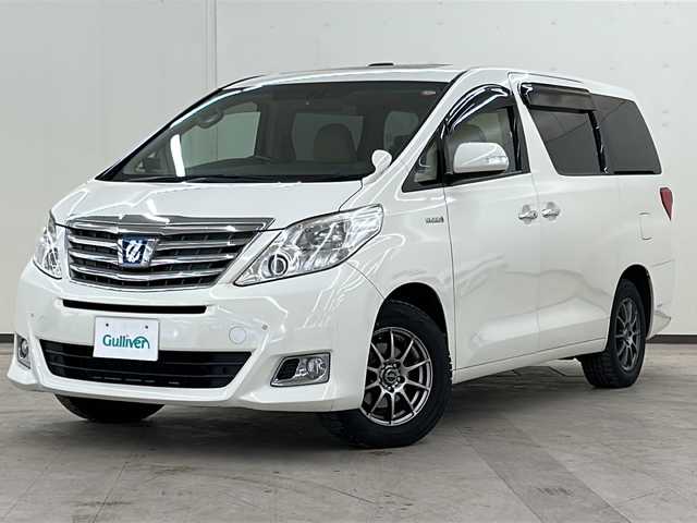 トヨタ アルファードハイブリット G 道央・札幌 2012(平24)年 14.5万km ゴールドパールクリスタルシャイン /4WD//社外HDDナビ(フルセグ、CD、DVD、Bt、AM、FM、SD)//ツインサンルーフ//バックカメラ//フリップダウンモニター//クルーズコントロール//両側パワースライドドア//革調シートカバー//パワーシート(D/N)//スマートキー//プッシュスタート//キセノンヘッドライト//オートライト//フォグランプ//社外16インチアルミホイール//純正16インチAW夏タイヤ車載//ETC//新車時保証書//取扱説明書//スペアキー×1