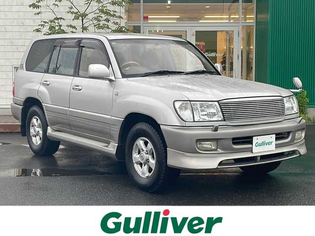 トヨタ ランドクルーザー VX－LTD 青森県 2000(平12)年 18.9万km ウォームシルバーM 4WD/社外SDナビ・フルセグTV/CD・DVD・Bluetooth/バックカメラ/クルーズコントロール/キーレスキー/ETC/ツインバッテリー/ヒッチメンバー/HIDライト/フォグランプ/純正16インチアルミ/スペアキー/保証書・取説書/ディーラー記録簿12枚あり/H26.10.19　102636km時Tベルト交換記録簿有