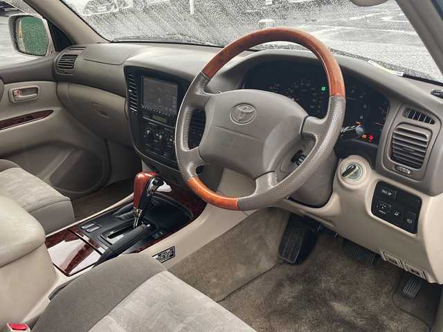 トヨタ ランドクルーザー VX－LTD 青森県 2000(平12)年 18.9万km ウォームシルバーM 4WD/社外SDナビ・フルセグTV/CD・DVD・Bluetooth/バックカメラ/クルーズコントロール/キーレスキー/ETC/ツインバッテリー/ヒッチメンバー/HIDライト/フォグランプ/純正16インチアルミ/スペアキー/保証書・取説書/ディーラー記録簿12枚あり/H26.10.19　102636km時Tベルト交換記録簿有