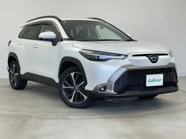 トヨタ カローラ クロス ハイブリッド Z 新潟県 2024(令6)年 2.3万km プラチナホワイトパールマイカ 10.5インチディスプレイオーディオ/(FM.AM.フルセグ.Bluetooth)/バックカメラ/トヨタセーフティセンス/・プリクラッシュセーフティ/・レーンキープアシスト/・レーダークルーズコントロール/・オートマチックハイビーム/革巻きステアリング/LEDオートライト/フォグランプ/ドライブレコーダー/ETC2.0/ハーフレザーシート/前席シートヒーター/プッシュスタート/スマートキー/純正フロアマット