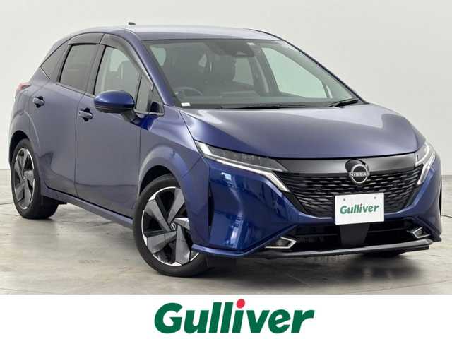 日産 オーラ G レザーエディション 福岡県 2022(令4)年 4.4万km オーロラフレアブルーパール 純正９型ナビ／フルセグＴＶ　/全方位カメラ　/ＢＯＳＥプレミアムサウンド　/ワイヤレス充電　/デジタルルームミラー　/前後ドライブレコーダー　/ＥＴＣ　/レーダー探知機　/エマージェンシーブレーキ　/レーンキープ　/ＢＳＭ　/ステアリングヒーター　/シートヒーター