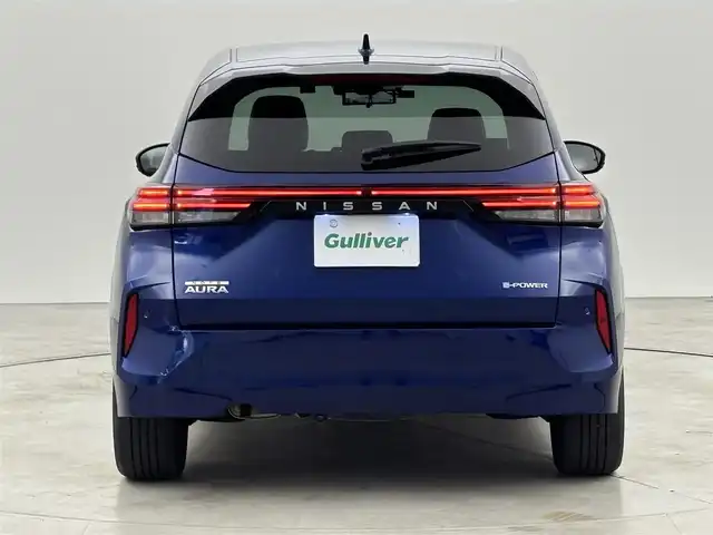 日産 オーラ G レザーエディション 福岡県 2022(令4)年 4.4万km オーロラフレアブルーパール 純正９型ナビ／フルセグＴＶ　/全方位カメラ　/ＢＯＳＥプレミアムサウンド　/ワイヤレス充電　/デジタルルームミラー　/前後ドライブレコーダー　/ＥＴＣ　/レーダー探知機　/エマージェンシーブレーキ　/レーンキープ　/ＢＳＭ　/ステアリングヒーター　/シートヒーター