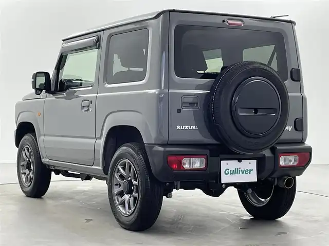 スズキ ジムニー XC 福井県 2023(令5)年 1.4万km ミディアムグレー 4WD/スズキセーフティサポート/ロッソモデロマフラー/社外フューエルリッド/IPFフォグランプ/クルーズコントロール/社外メモリナビ/-フルセグTVCD/DVD/Bluetooth/バックカメラ/ドライブレコーダー/ドアバイザー/フロアマット/前席シートヒーター/純正１６インチAW/プッシュスタート/スマートキー