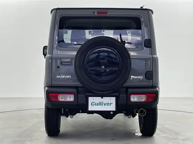 スズキ ジムニー XC 福井県 2023(令5)年 1.4万km ミディアムグレー 4WD/スズキセーフティサポート/ロッソモデロマフラー/社外フューエルリッド/IPFフォグランプ/クルーズコントロール/社外メモリナビ/-フルセグTVCD/DVD/Bluetooth/バックカメラ/ドライブレコーダー/ドアバイザー/フロアマット/前席シートヒーター/純正１６インチAW/プッシュスタート/スマートキー