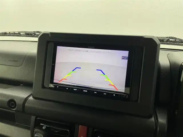 スズキ ジムニー XC 福井県 2023(令5)年 1.4万km ミディアムグレー 4WD/スズキセーフティサポート/ロッソモデロマフラー/社外フューエルリッド/IPFフォグランプ/クルーズコントロール/社外メモリナビ/-フルセグTVCD/DVD/Bluetooth/バックカメラ/ドライブレコーダー/ドアバイザー/フロアマット/前席シートヒーター/純正１６インチAW/プッシュスタート/スマートキー