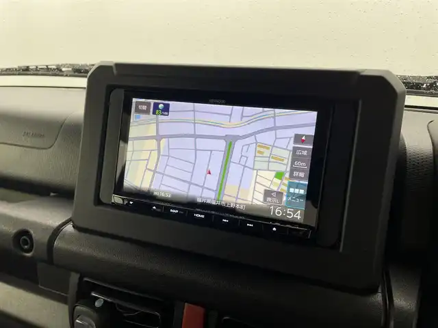 スズキ ジムニー XC 福井県 2023(令5)年 1.4万km ミディアムグレー 4WD/スズキセーフティサポート/ロッソモデロマフラー/社外フューエルリッド/IPFフォグランプ/クルーズコントロール/社外メモリナビ/-フルセグTVCD/DVD/Bluetooth/バックカメラ/ドライブレコーダー/ドアバイザー/フロアマット/前席シートヒーター/純正１６インチAW/プッシュスタート/スマートキー